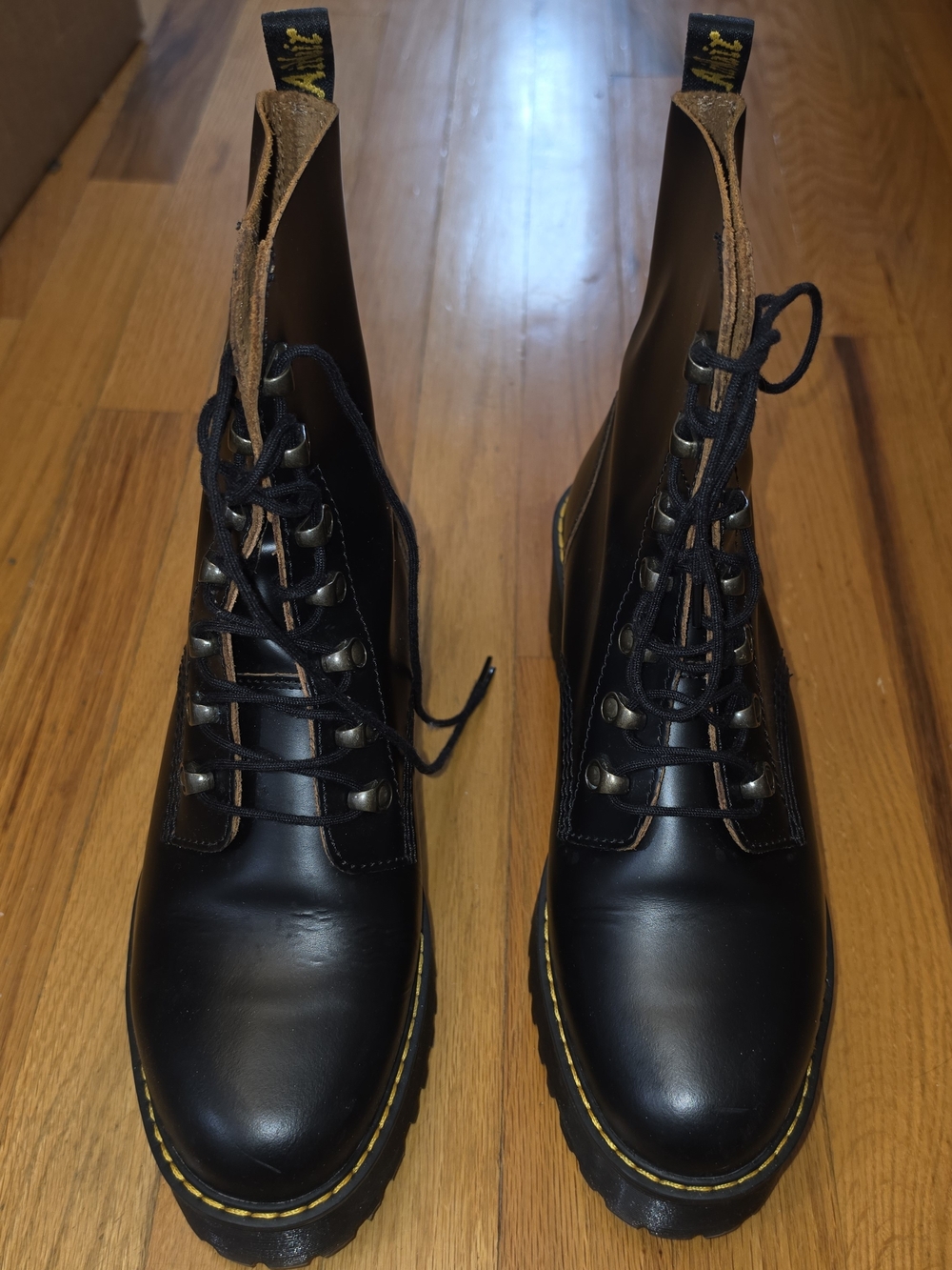 Dr. Martens Leona Black Leather Lace-Up Platform Boots